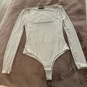prettylittlething | cream long sleeve bodysuit